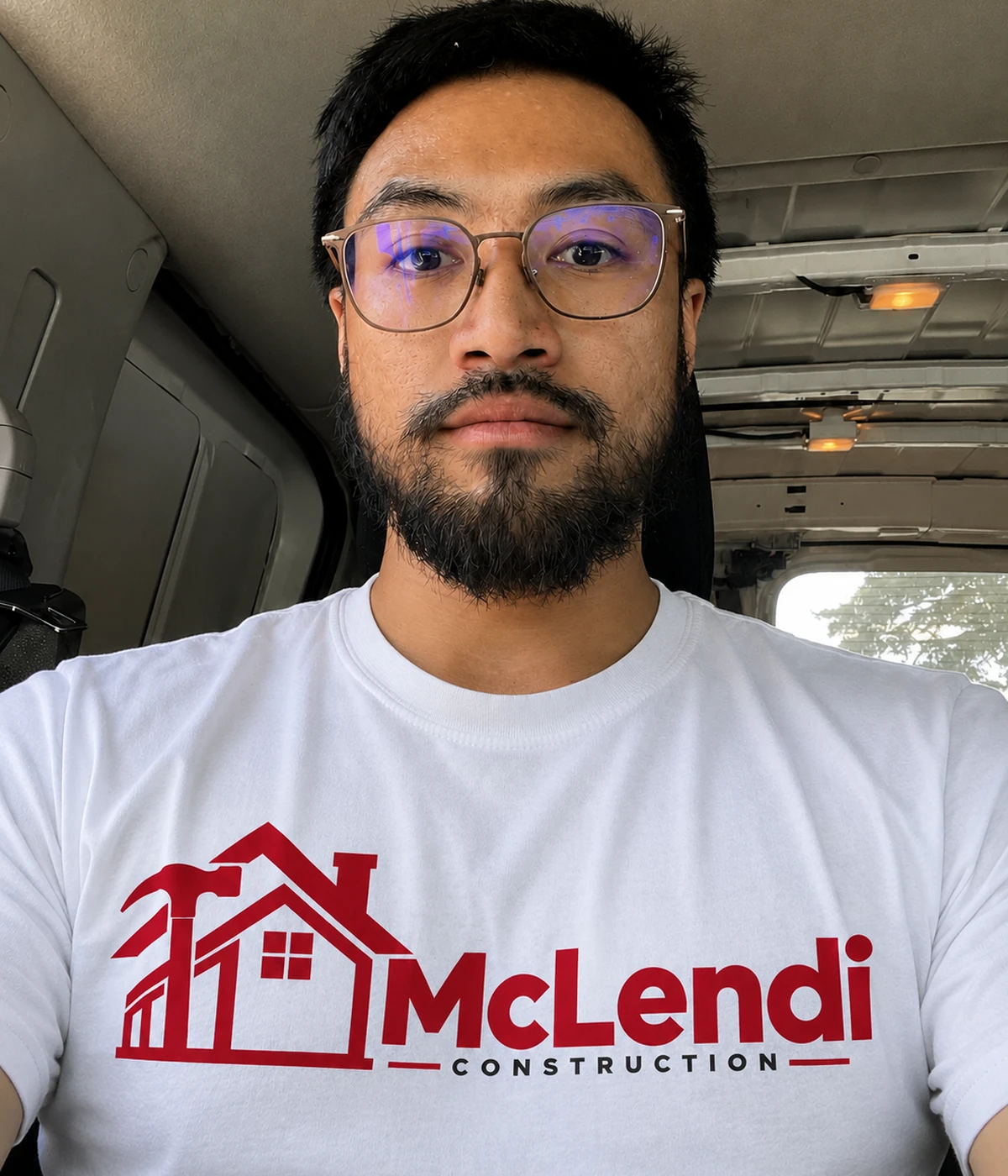 Real owner/team portrait at a clean residential jobsite